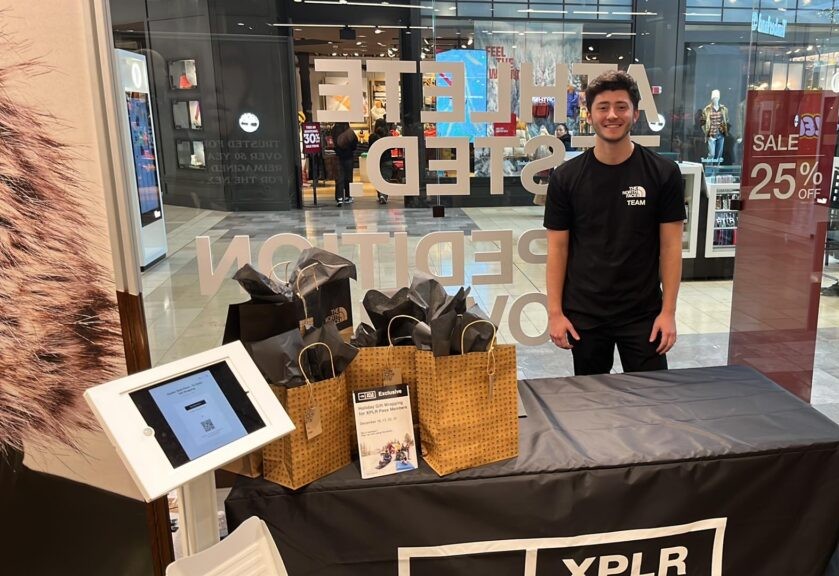 Staff at a retail activation table